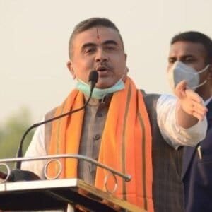 Suvendu Adhikari speaking passionately during a political rally in Bengal.